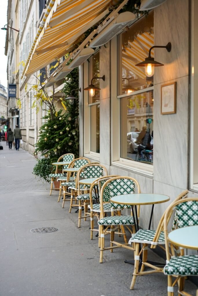 Margot Doree Life style cafe empty chairs and tables outside building